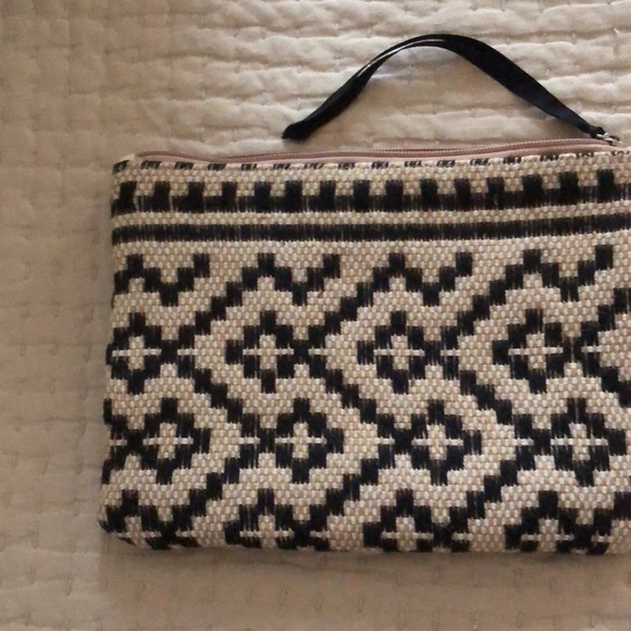 Mango clutch. Textured geometric pattern. Zip top w/ black grosgrain ribbon pull - Picture 5 of 11